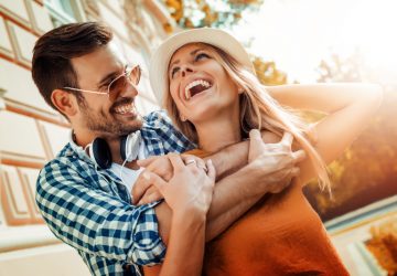 Smiling couple in love outdoors