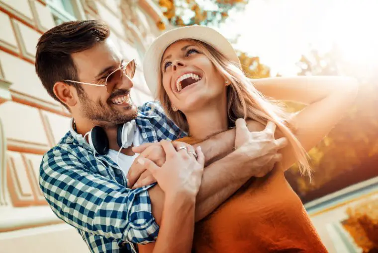Smiling couple in love outdoors